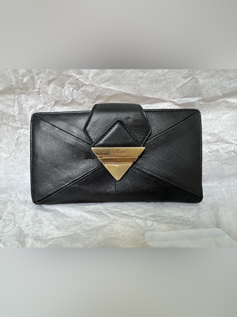 Botkier Black Soft All leathet Envelope Wallet with push lock and metal frame.